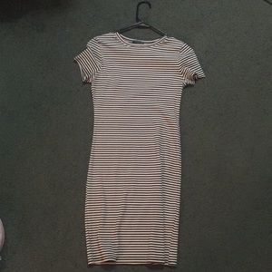 Thigh length black and white dress